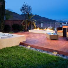 Modern Backyard With Mangaris Wood Deck and Hot Tub