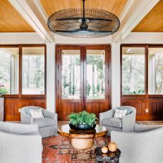 Neutral Eclectic Sitting Room With Gray Chairs