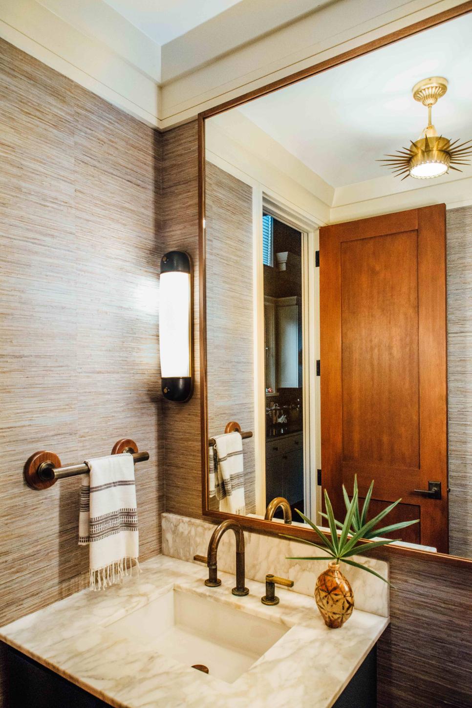 Neutral Powder Room With Sunburst Light | HGTV