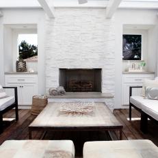 White Outdoor Space With Fireplace