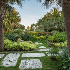 Tropical Garden With Stone Slab Pathway