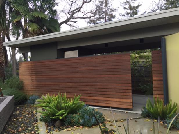 Mid-century Modern Courtyard with Sliding Ipe Fence | HGTV