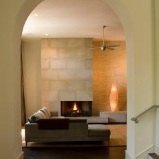 Arched Entryway to Contemporary Living Room