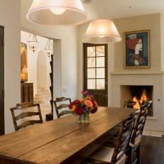 Neutral Dining Room With Fireplace