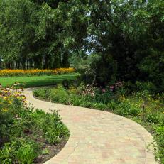 Brick Paver Pathway In The Backyard