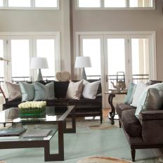 Neutral Transitional Living Room with Ample Windows
