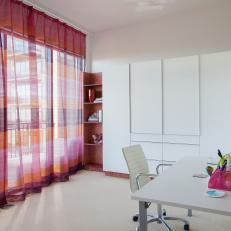 Modern Office Features Clean Lines, Sleek Storage & Bright Window Treatment