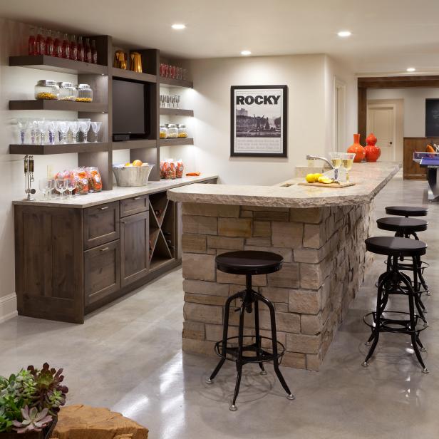 Transitional Bar With Stacked Stone Island and Open Shelving | HGTV