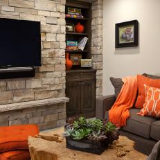 Contemporary Living Room With Stacked Stone Statement Wall