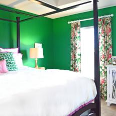 Green Master Bedroom Highlighted with Clean White Bedding and Floral Curtains