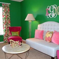 Bright, Feminine Sitting Area in a Green and Pink-Accented Bedroom