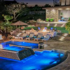 Enchanting Swimming Pool Surrounded by Tropical Plants, Levels of Hardscape, Fire Pit and Sitting Area Options 