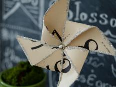 Use old book pages, flash cards, scrapbook paper or even sheet music to make these sweet pinwheels that can bring a festive, playful touch to parties and holidays. They're a snap to make so you can whip up an entire bouquet of them to display in flowerpots, baskets, buckets or pitchers.  