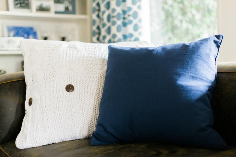 Blue and White Throw Pillows on Sofa