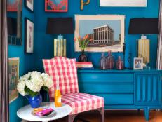 Sitting Area With Gingham Chair, Blue Gallery Wall, and Blue Dresser