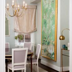 Traditional Dining Room With Oversized Artwork