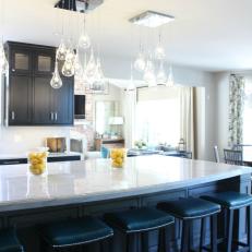 Transitional Open Kitchen With Glass Pendant Lights