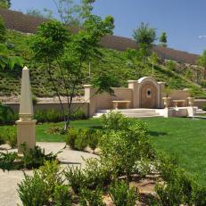 Retaining Wall Separates Hillside from Backyard Space