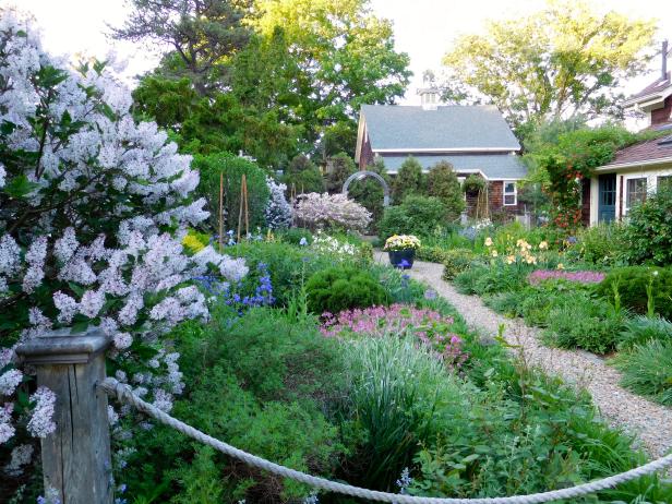 A Gravel Pathway Through A Formal Cottage Garden Hgtv