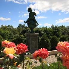 A Formal English Rose Garden with Antique Sculptures