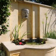 A Formal Water Feature Nestled in a Hedge