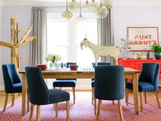 Transitional Dining Room With Folk-Art Style and Vintage Accents