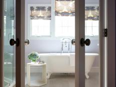 French Doors Opening Into Purple Master Bath With Claw-Foot Tub