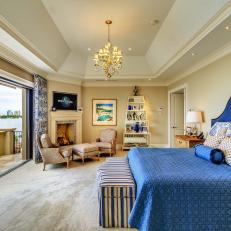 Spacious Master Bedroom With Bright Blue Bed Facing Full-Wall, Bay View Balcony Opening 