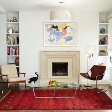 White Midcentury Living Room With Red Rug