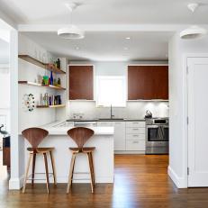 White Open Plan Contemporary Kitchen With Wood Floor