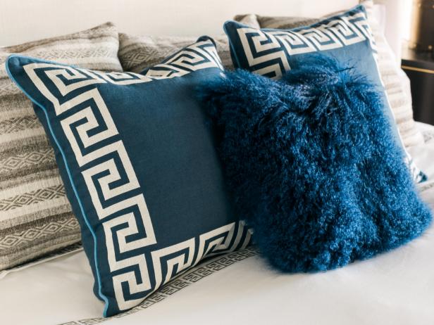 HGTV Dream Home 2017: Blue and White Throw Pillows on Bed
