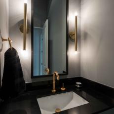 Contemporary Powder Room With Gold Accents
