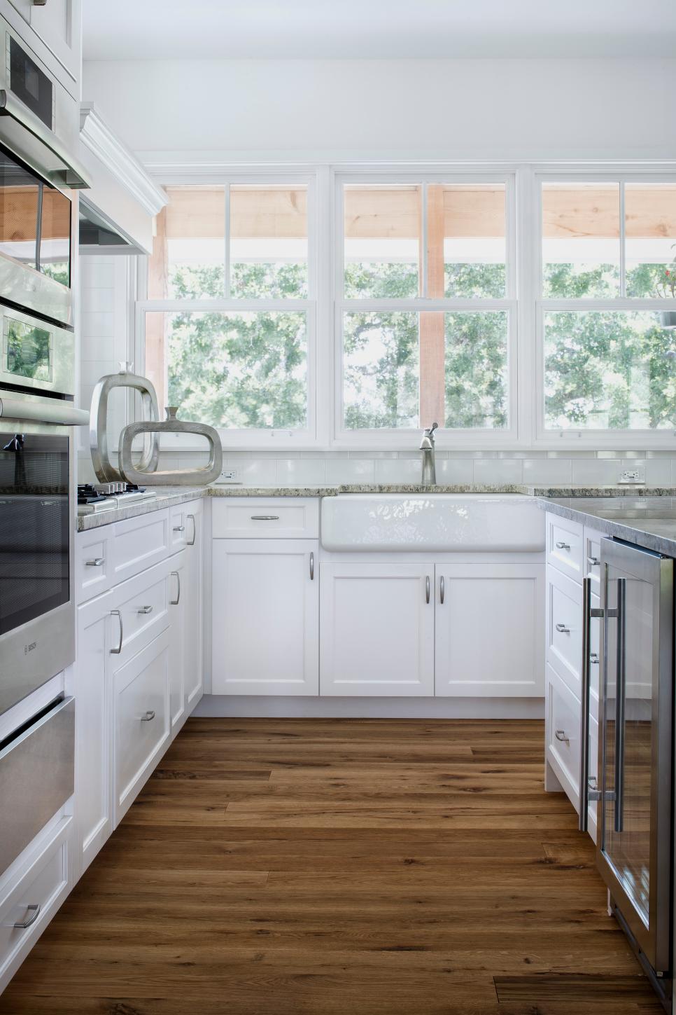 Bright White Farmhouse Sink in Contemporary Kitchen | HGTV