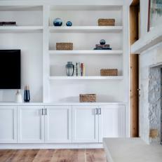 Built-In Bookshelves in Contemporary White Living Room
