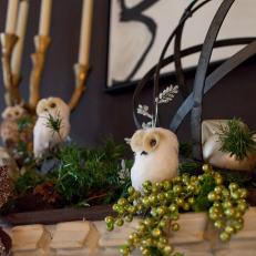 Winter Mantel with Decorative Owls and Greenery