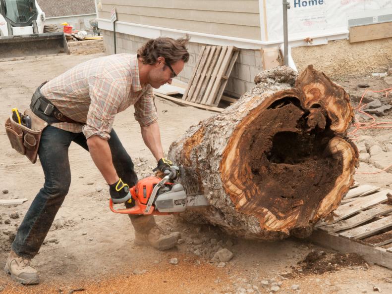 Step 1: HGTV Urban Oasis 2016 in Ann Arbor, MI, Host Matt Blashaw uses a chainsaw to cut a section out of a large tree stump to make a backyard planter.
