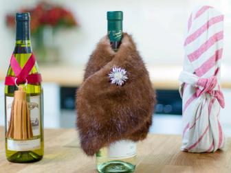 Gifting wine at the holidays is classic and well-received universally, but when paired with totally unique gift-wrapping, this go-to gift idea quickly becomes something very special.