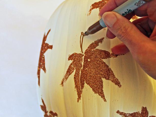 Brush glue onto green, pliable backyard leaves to create a natural, leaf-shaped stamp.