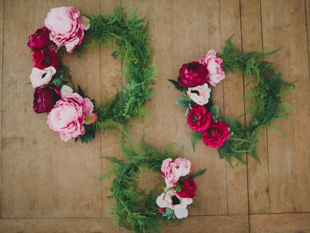 Three Green Wreaths With Light Pink and Fuchsia Flowers