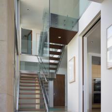 Open, Contemporary Foyer With Floating Stairs