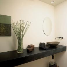 Asian Powder Room With Black Countertop