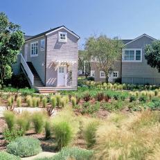 Gray Cape Cod Exterior and Field
