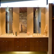 Neutral Double Vanity Bathroom With Stone Wall