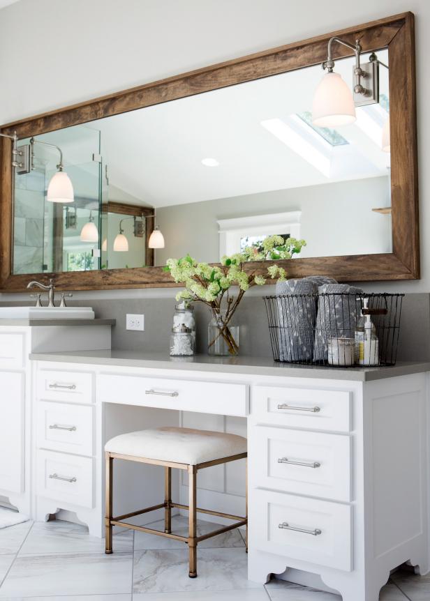 White and Gray Bathroom With Built-In Makeup Vanity and Large Mirror