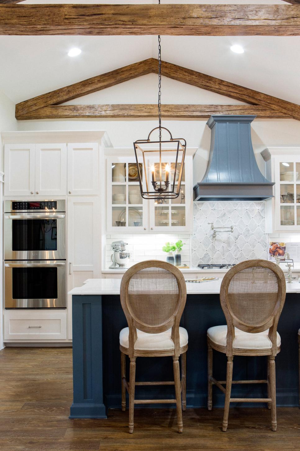 Light and Bright Kitchen With Exposed Beam Vaulted Ceilings | HGTV