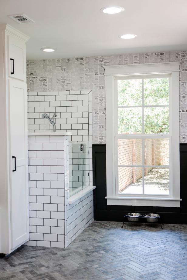 Black and White Mud Room With Dog Shower and Black Wainscoting