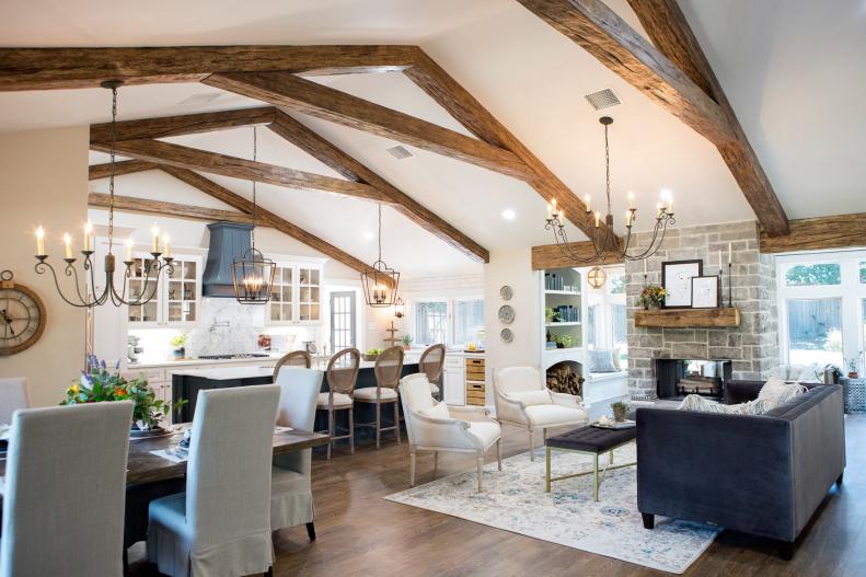 Neutral and Gray Living Space With Exposed Beam Vaulted Ceilings
