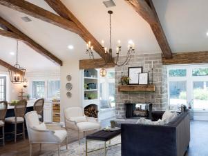 Open Concept Living Room With Exposed Beam Vaulted Ceilings