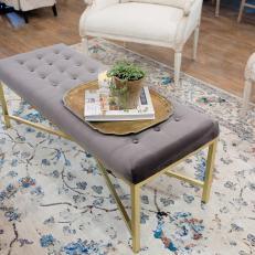 Gray Tufted Coffee Table With Floral Area Rug