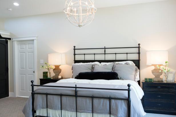 Light And Bright Master Bedroom With Black Metal Bed Frame